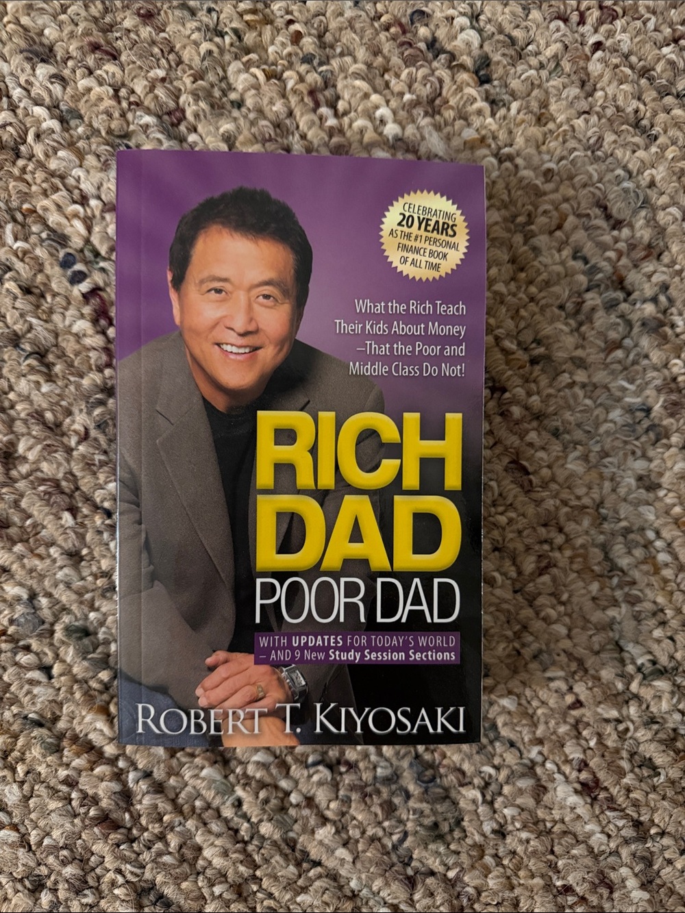 Rich Dad Poor Dad by Robert T. Kiyosaki - Purple Cover